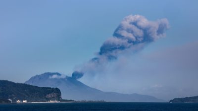 smoke coming from a mountain
