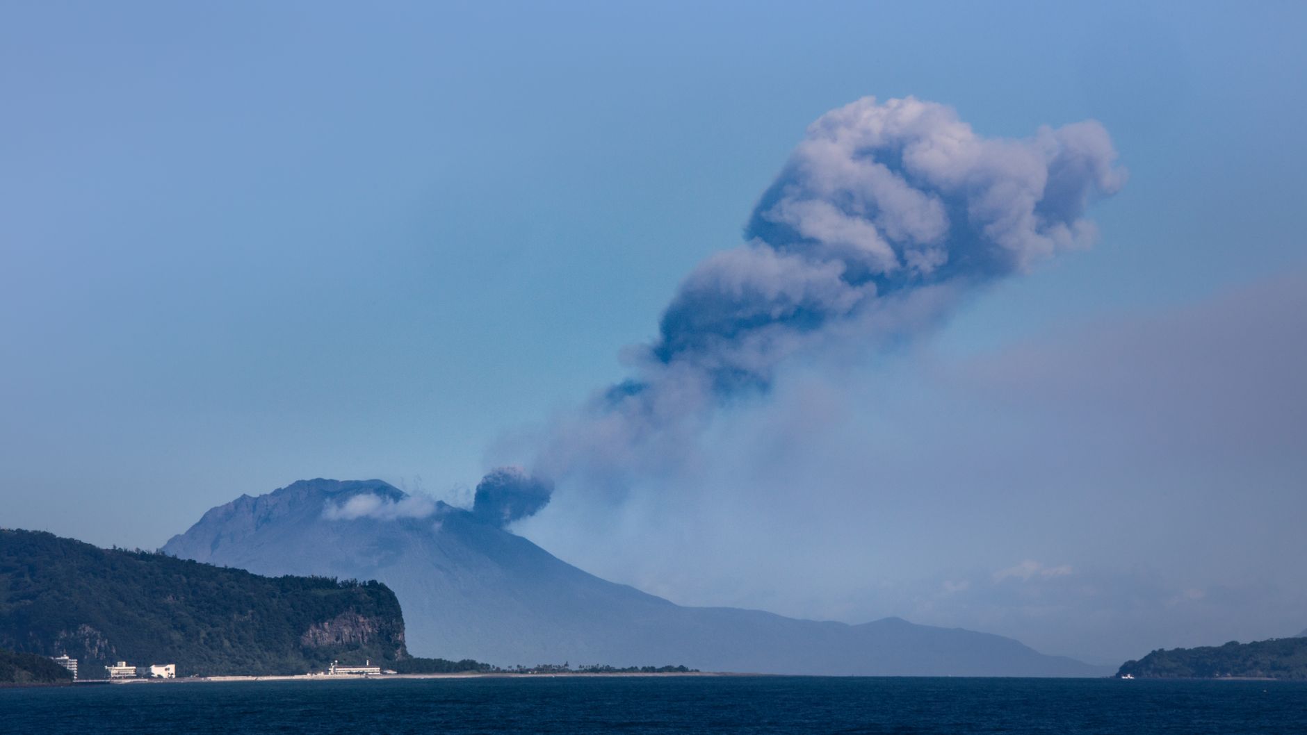 smoke coming from a mountain