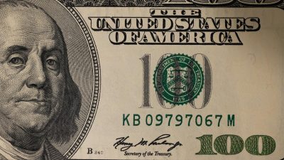 close up photography of one hundred dollar bill