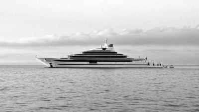 grayscale photo of cruise ship on sea