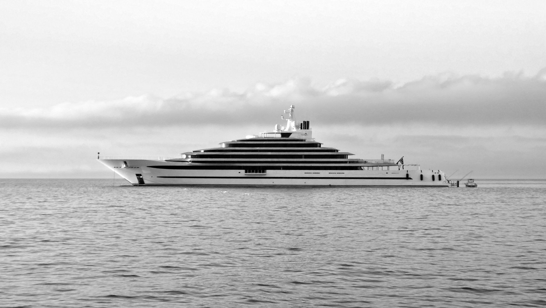 grayscale photo of cruise ship on sea