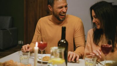 man and woman laughing