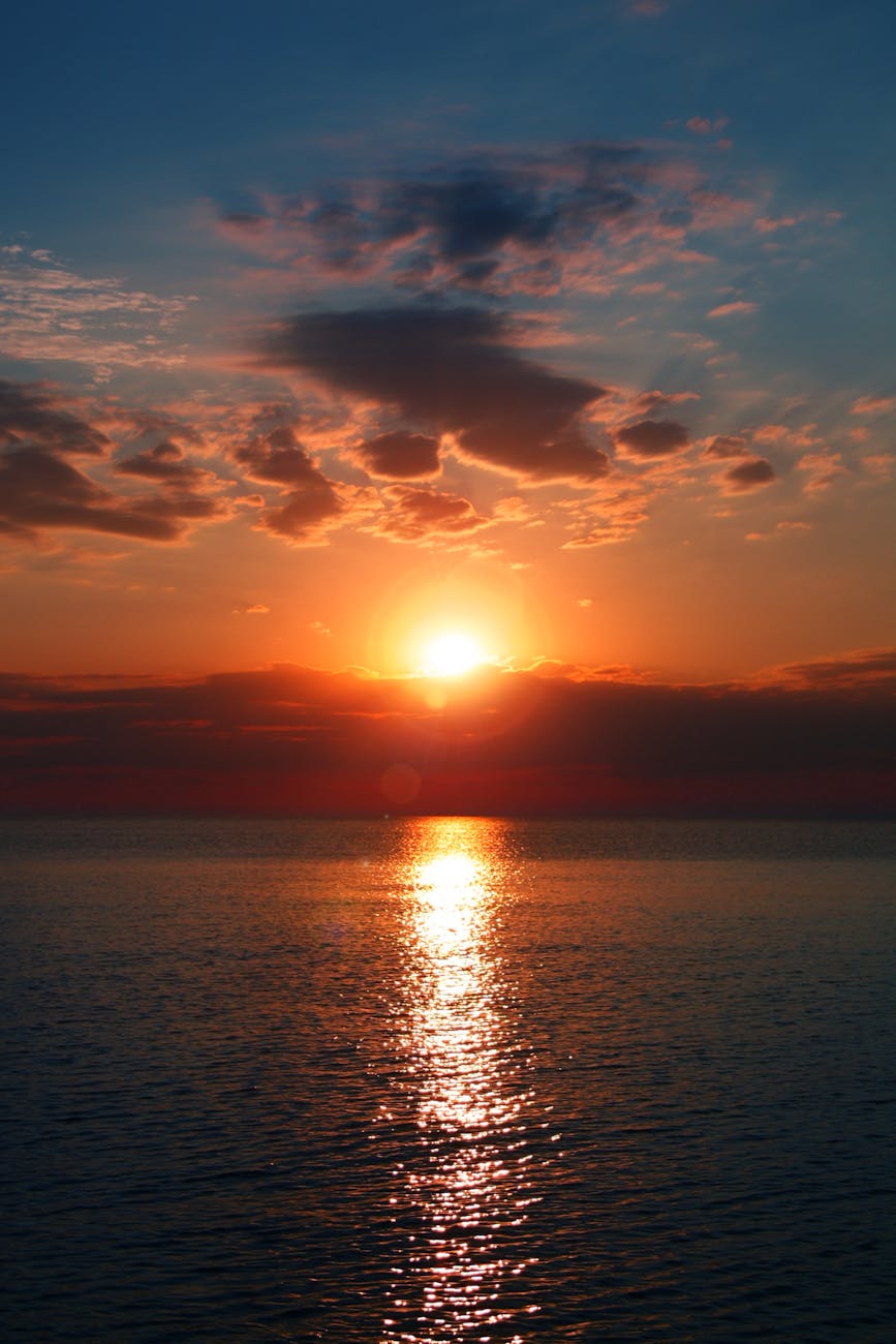 calm blue sea during golden hour