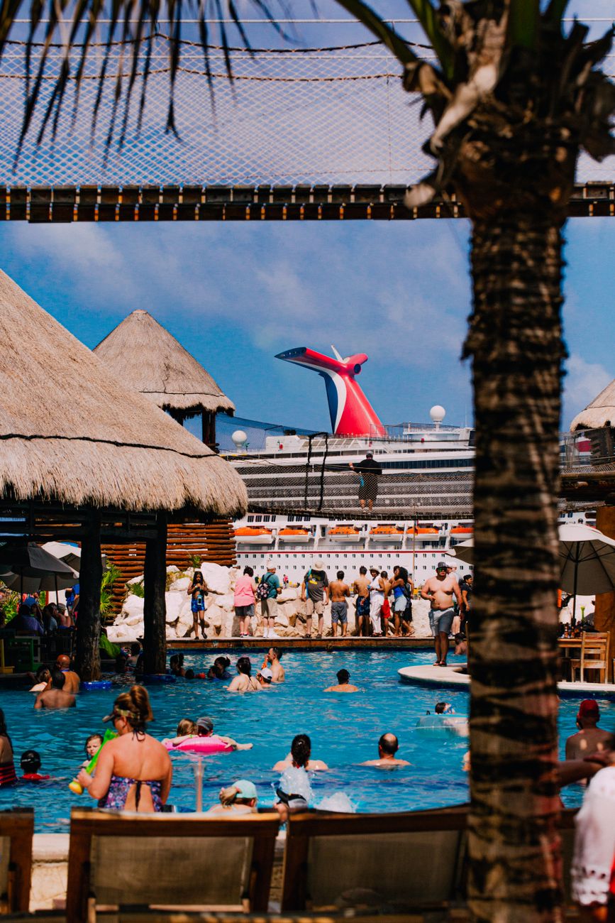 people swimming on the pool