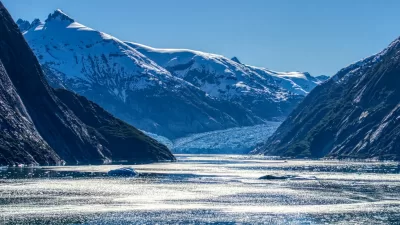 fjord among snowcapped mountains