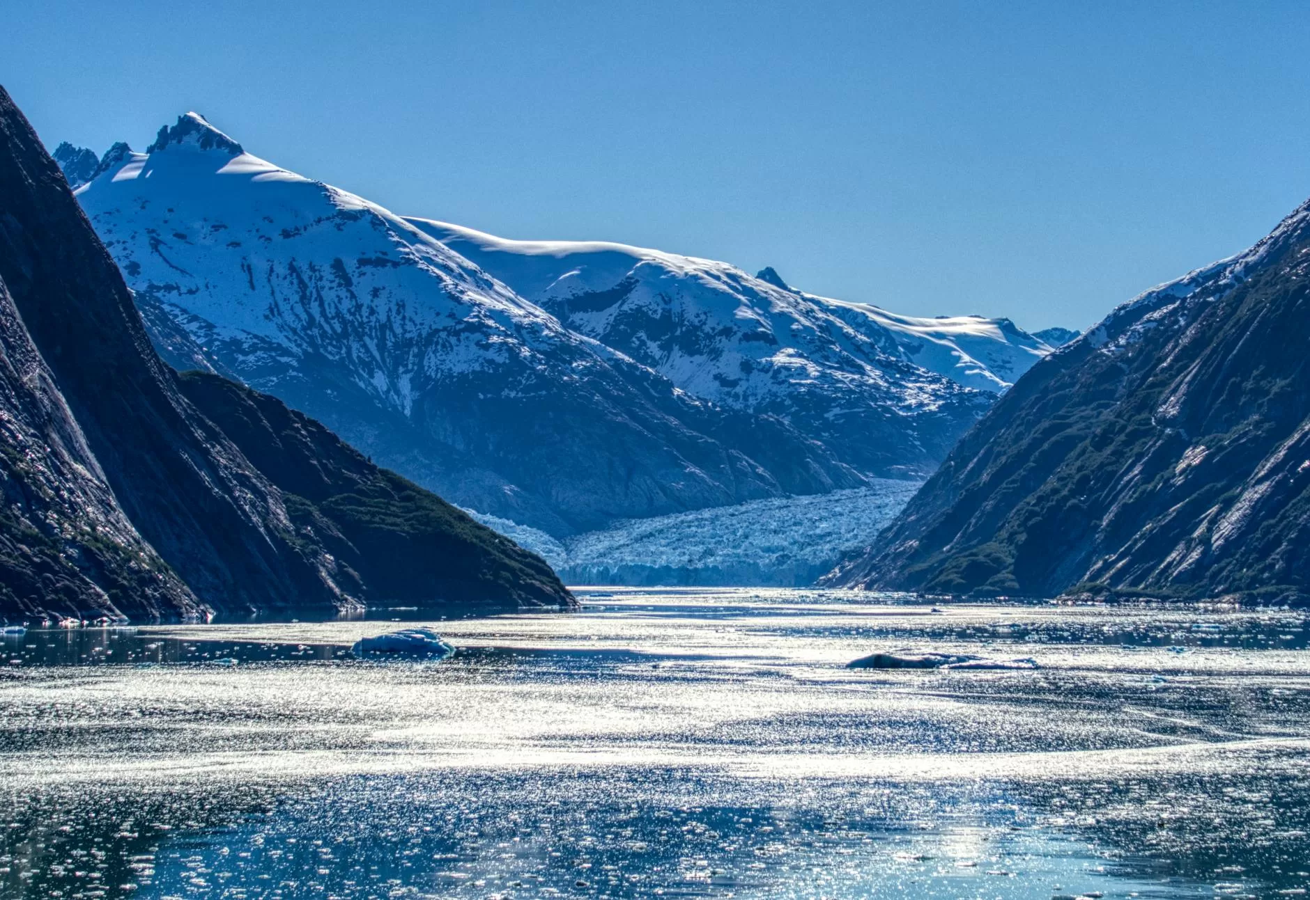 fjord among snowcapped mountains