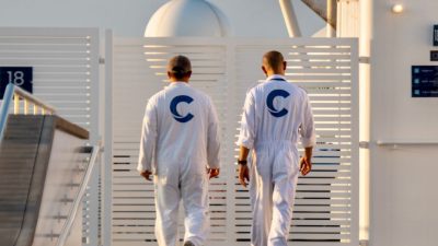 two workers on a ship