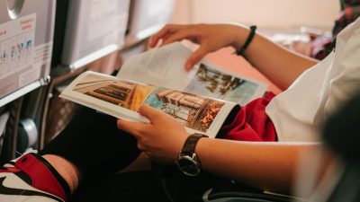 person reading a magazine