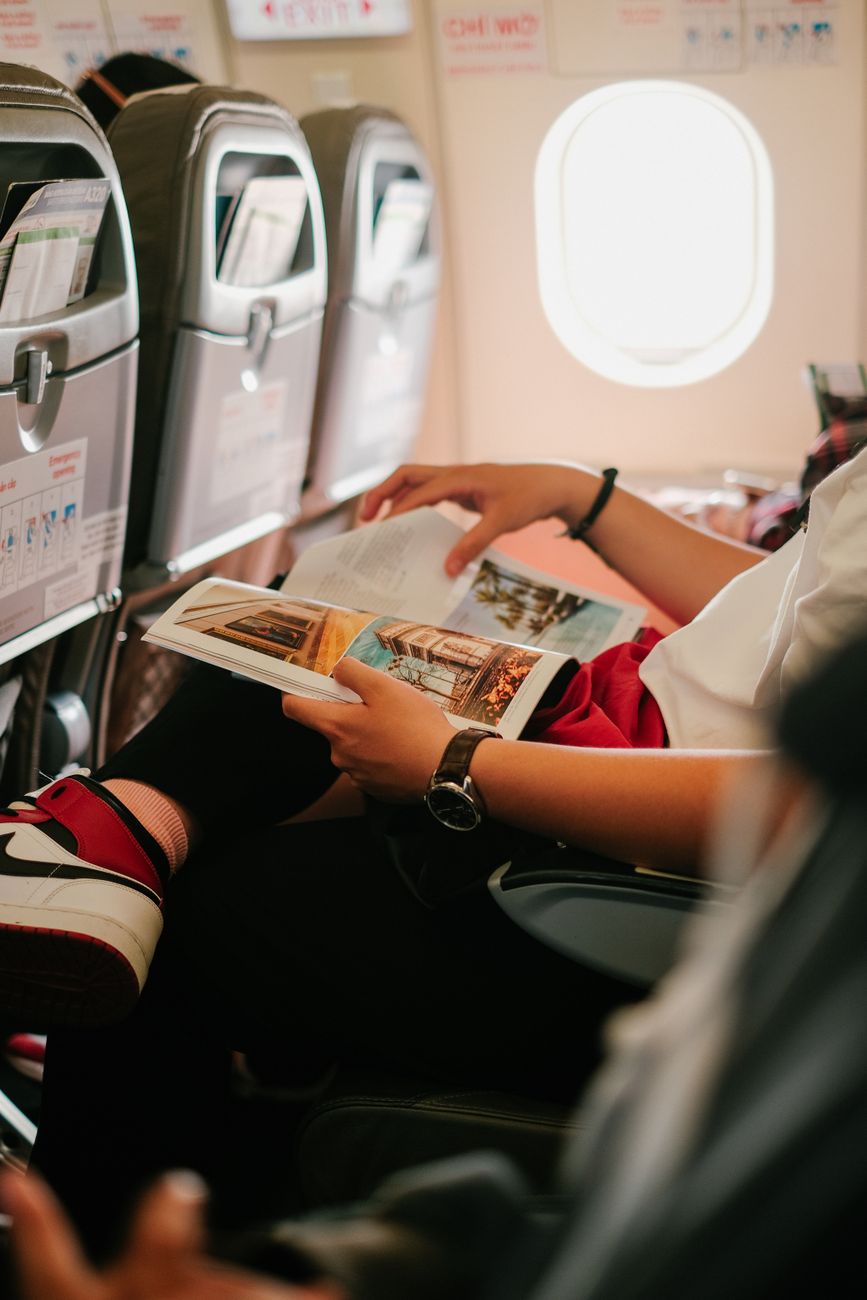 person reading a magazine