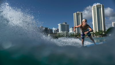 person surfing on the wave