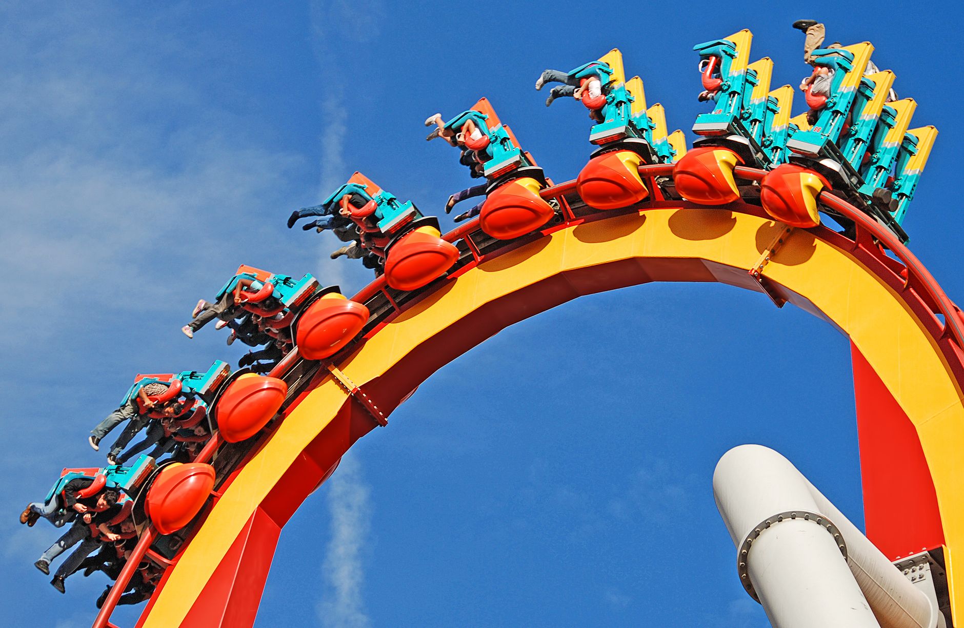 people riding roller coaster