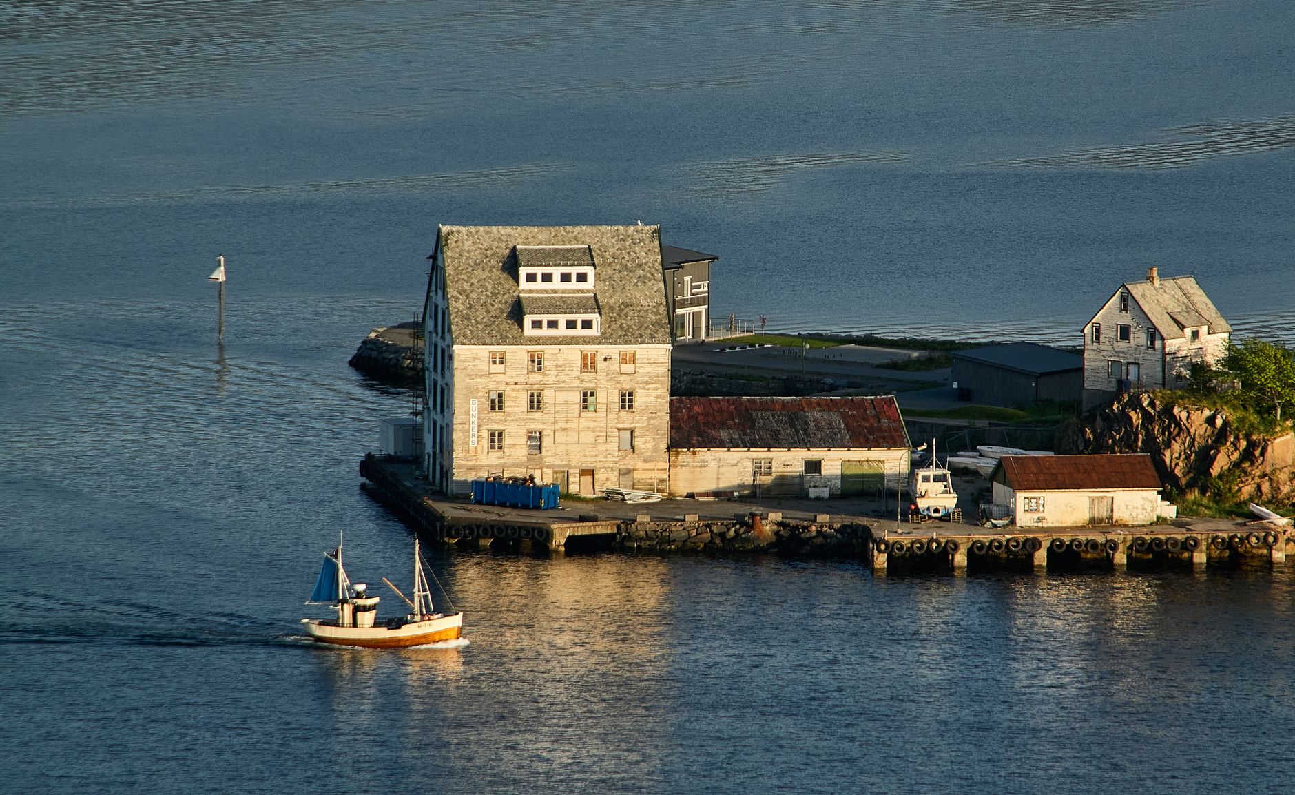 house on an island in the middle of sea