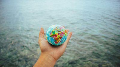 hand holding globe