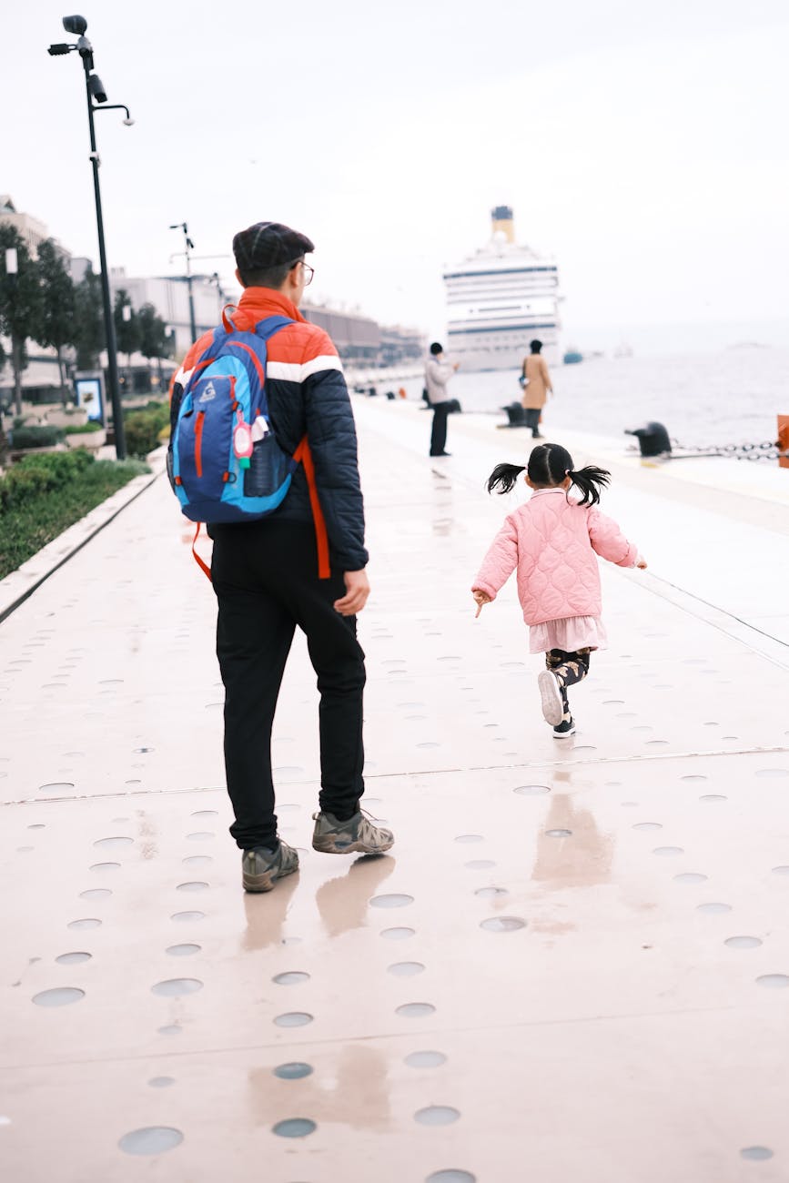 father with daughter on promenade