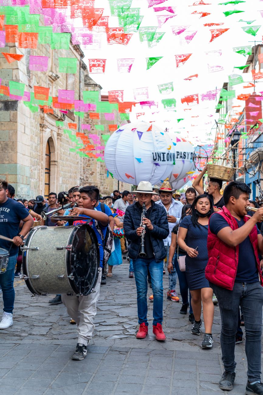 city street and parade with musicians