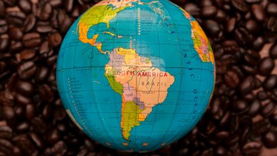 coffee beans around south america on globe
