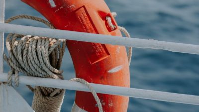 close up of a lifebuoy attached to the taffrail
