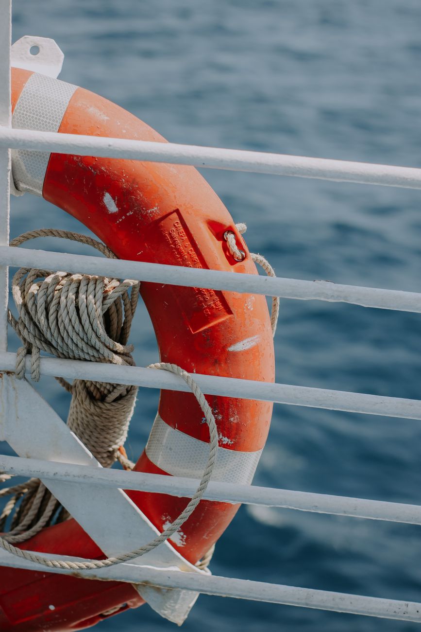 close up of a lifebuoy attached to the taffrail