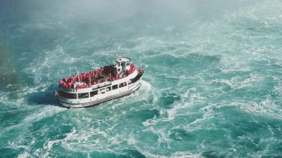white and red boat on boat trailer