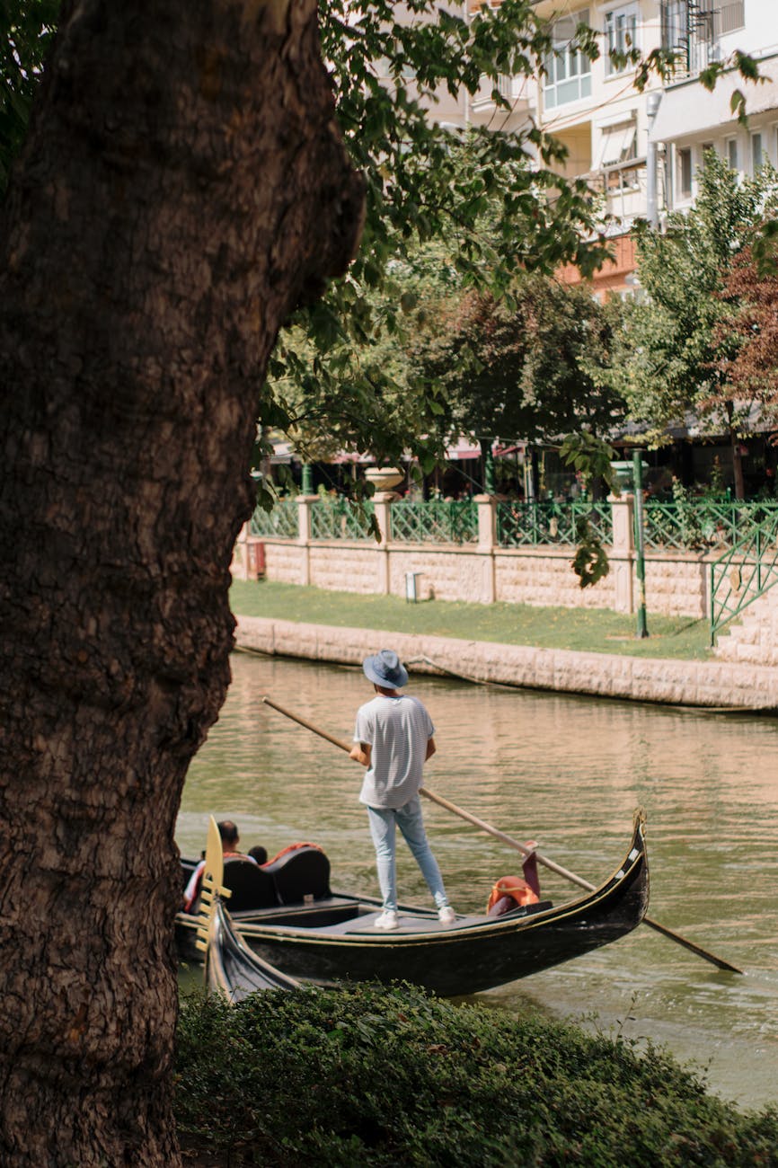 gondolier taking tourists around porsuk stream