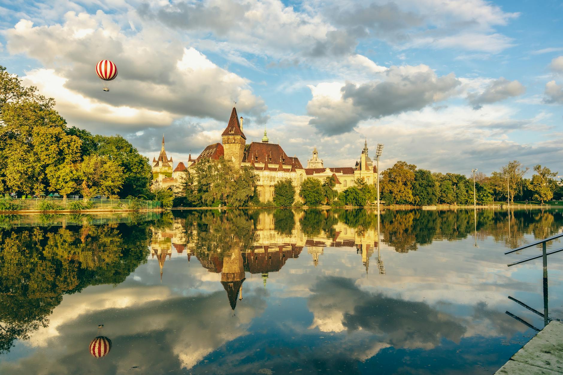 vajdahunyad castle reflecting in river