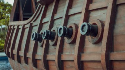 a wooden ship with several holes in it