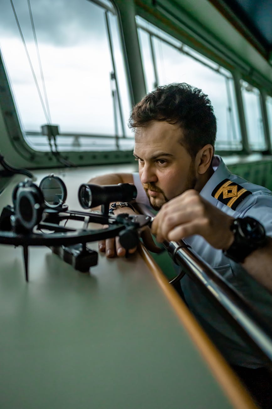 ships second officer looking at the sextant