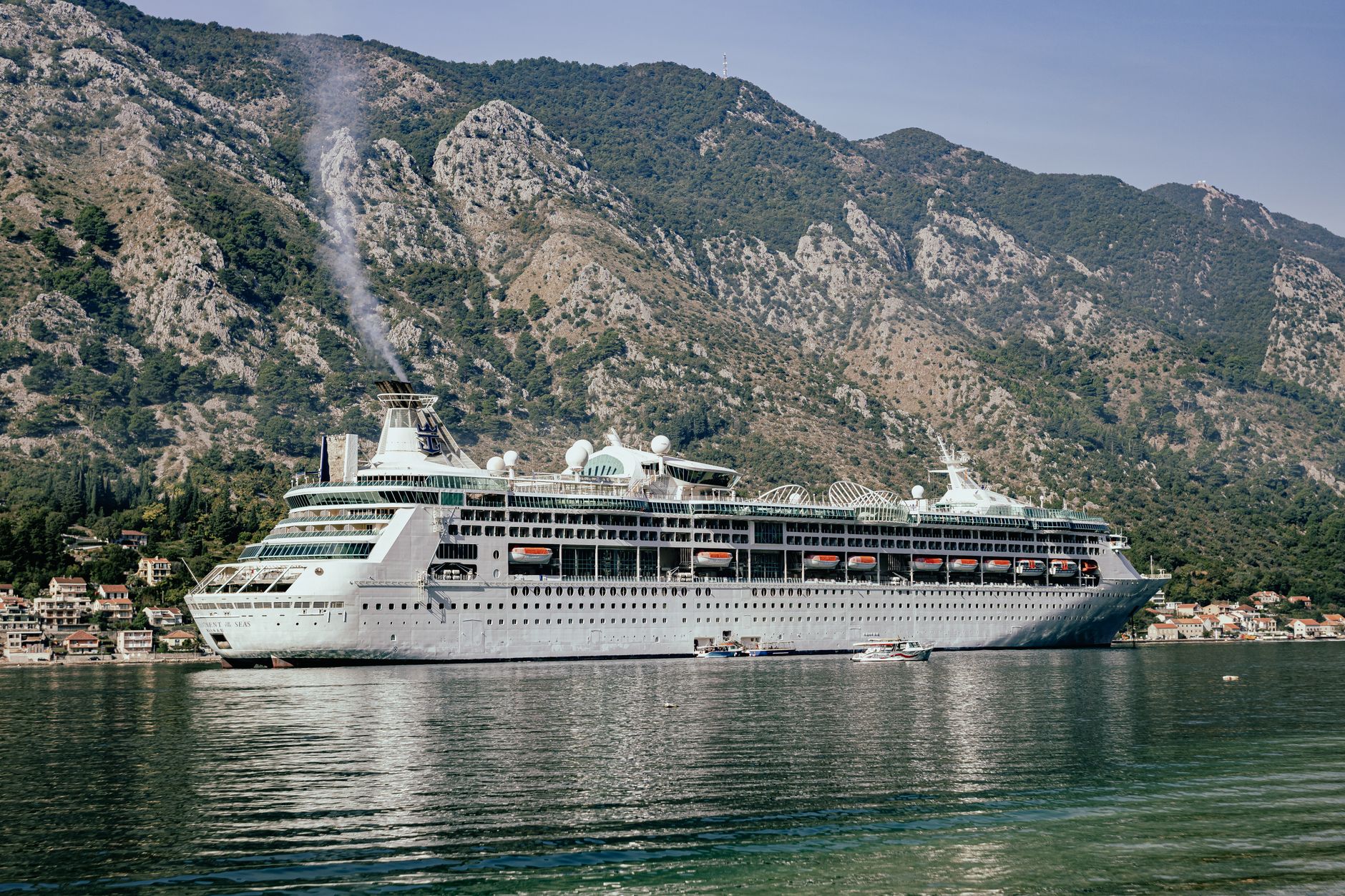cruise ship at a coastal town
