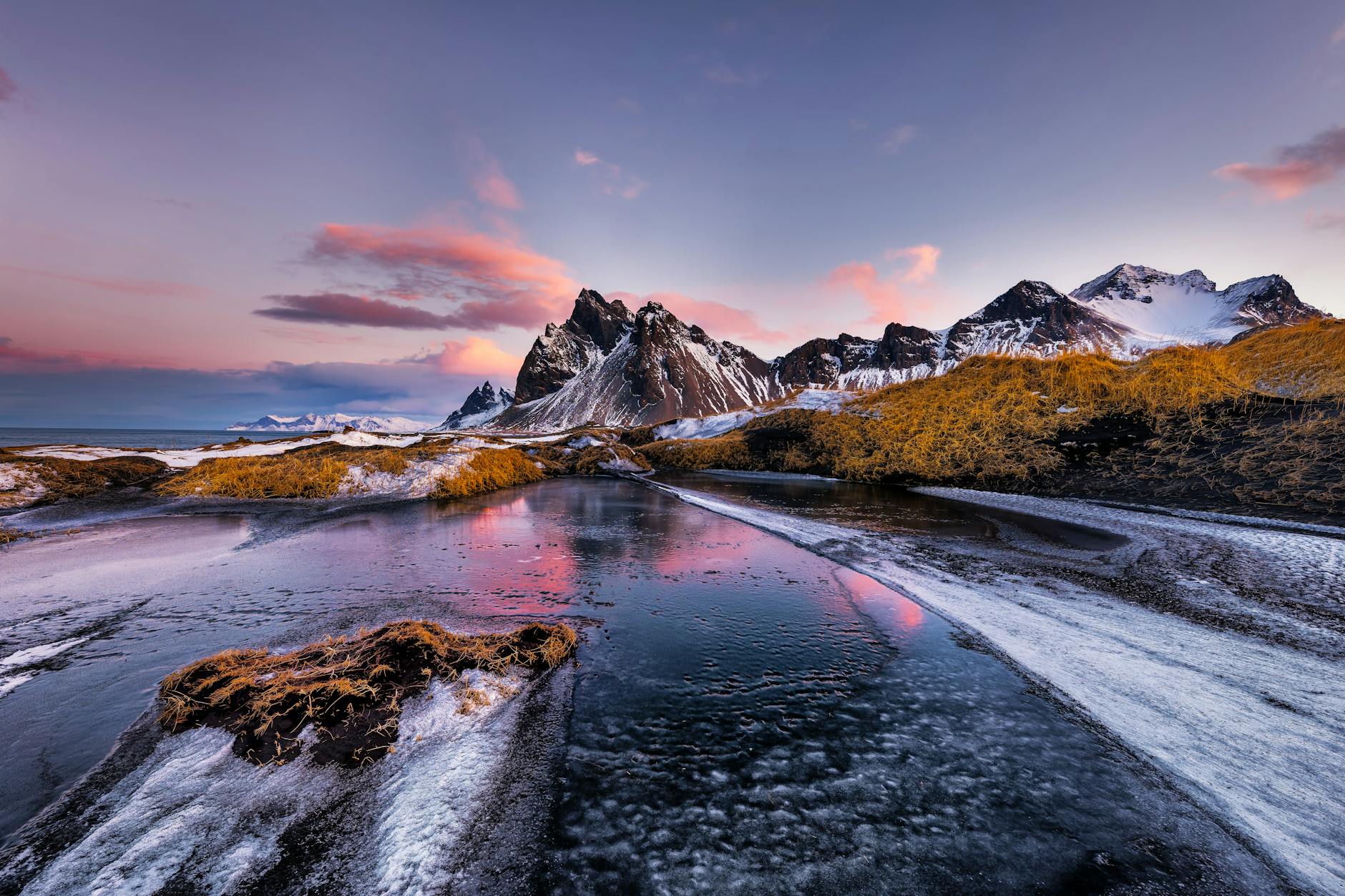 mountains on sea coast in winter