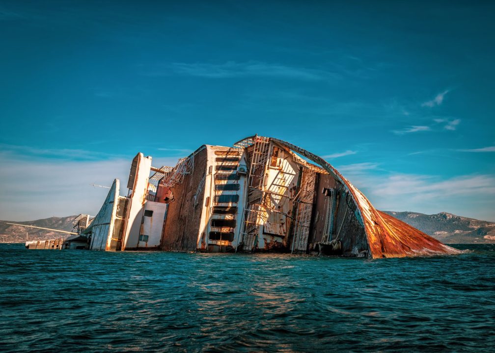 white and black sunken ship