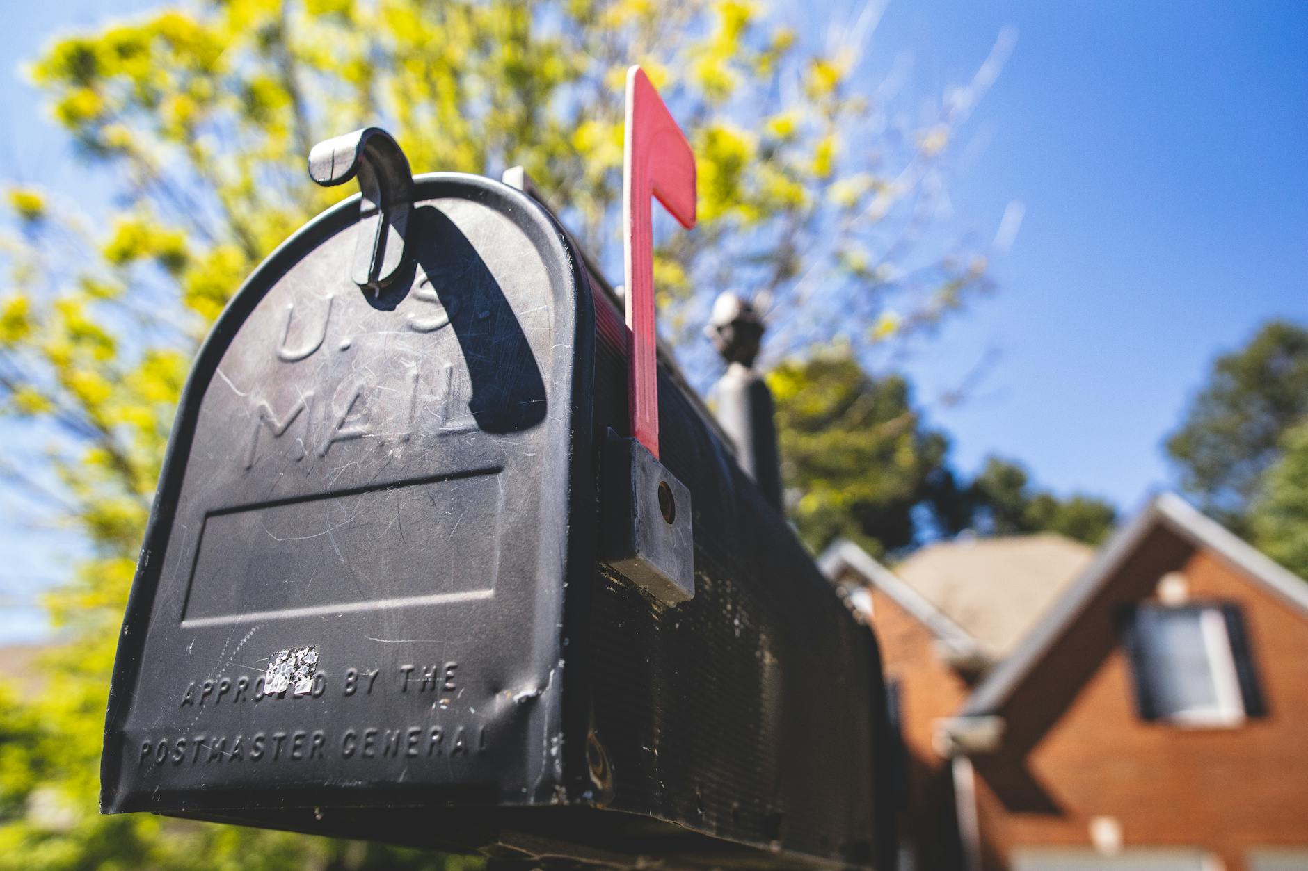 selective focus photography of a mailbox