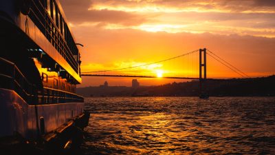 ferry sailing on bosporus at sunset