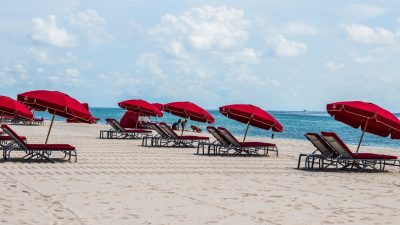 deckchairs and umbrellas on a sandy beach