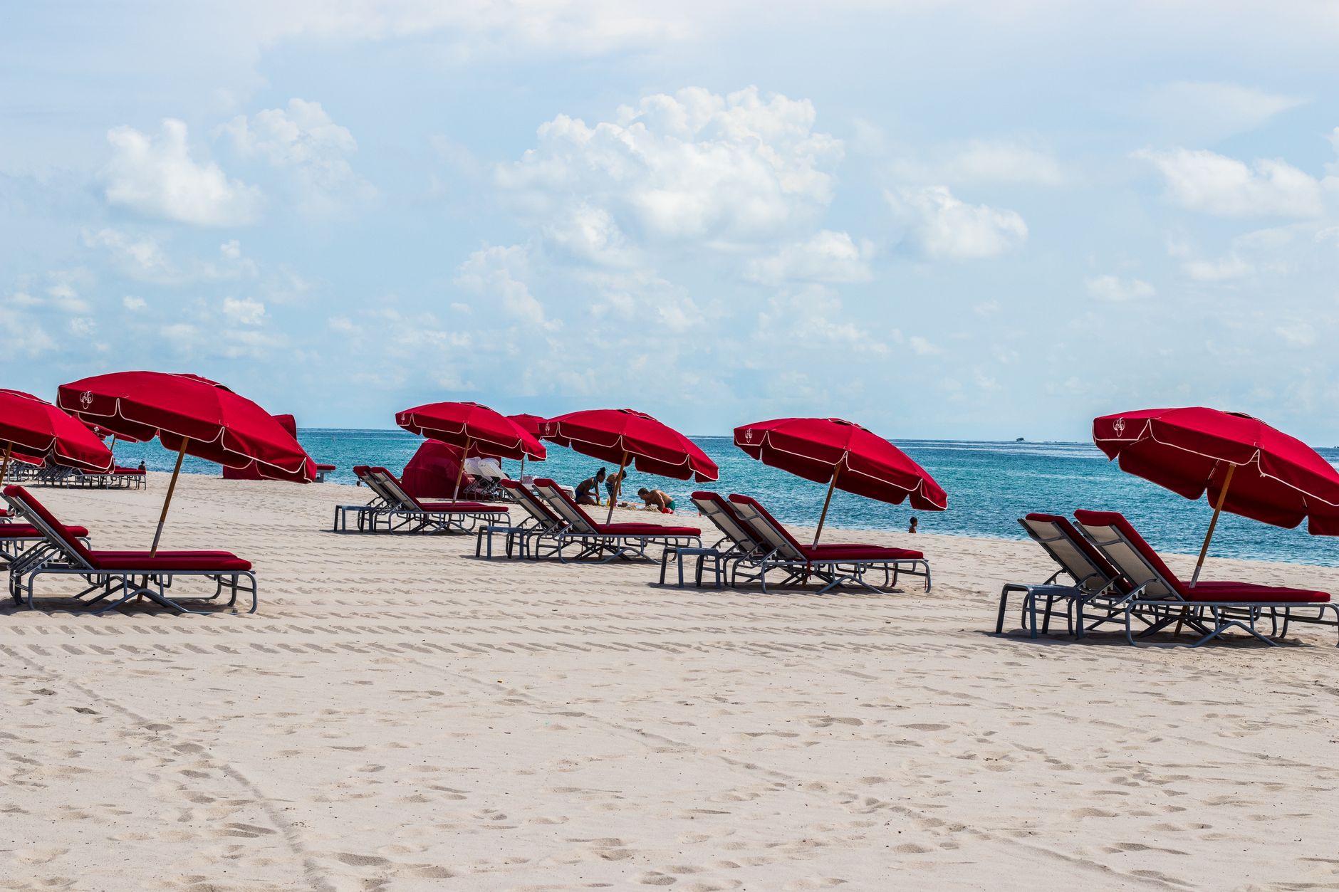 deckchairs and umbrellas on a sandy beach