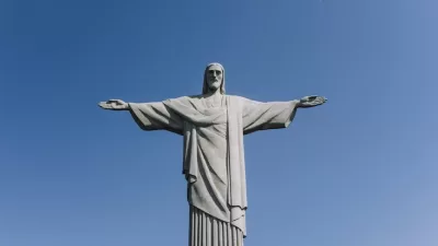 view of a crowd in front of the christ the redeemer statue in rio de janeiro brazil