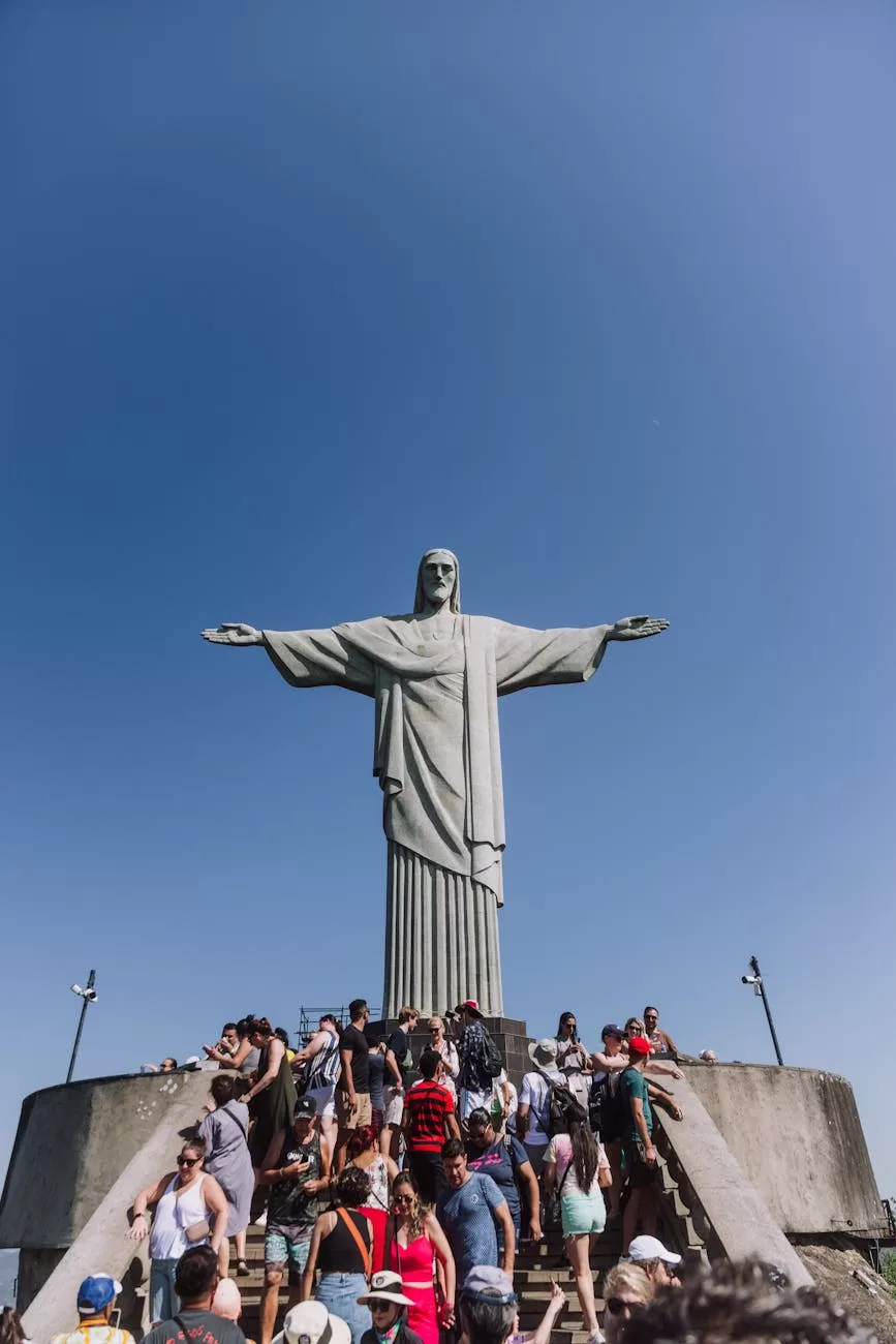 view of a crowd in front of the christ the redeemer statue in rio de janeiro brazil