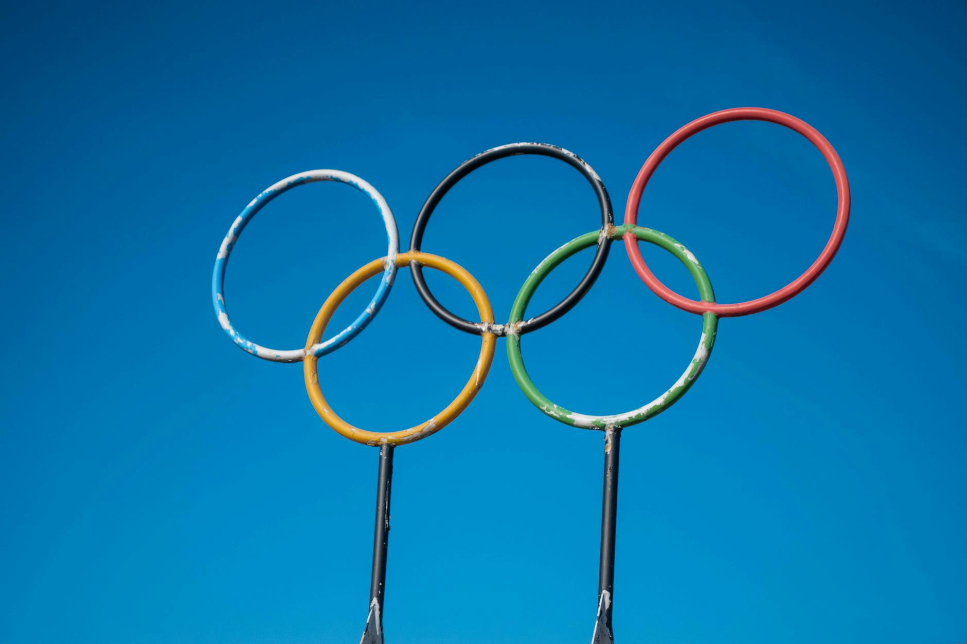olympic rings against a clear blue sky