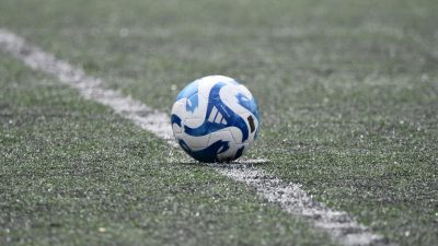 adidas tiro league ball on the soccer field