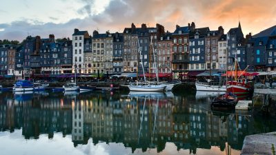 a city with boats docked in the water