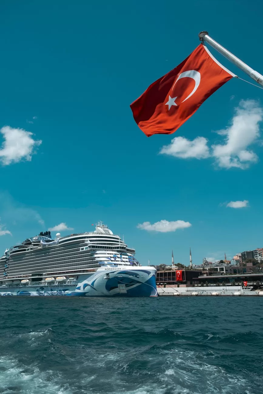 a cruise ship with a turkish flag in the water