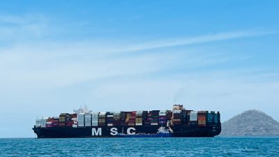 a container ship sailing in the ocean