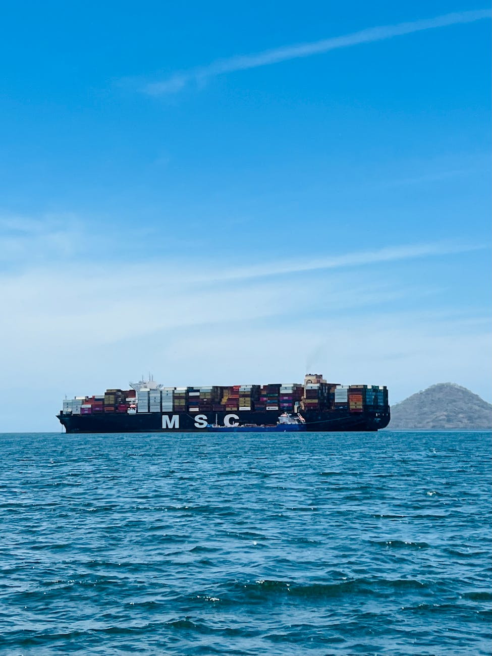a container ship sailing in the ocean