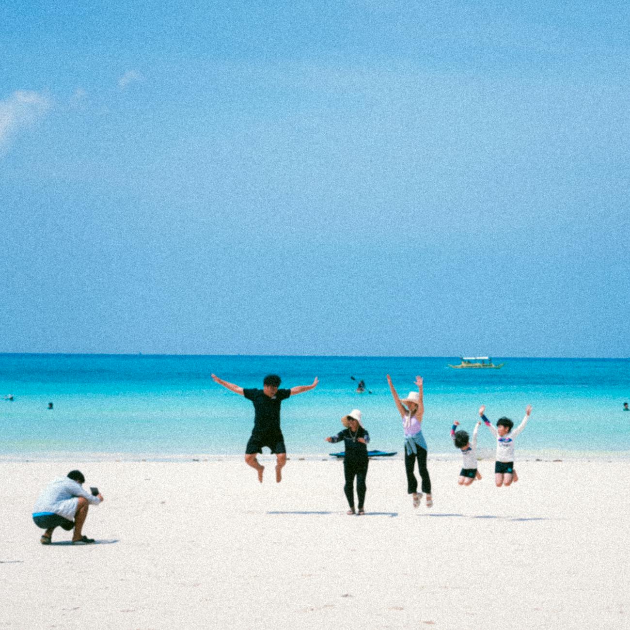 family fun day at tropical beach