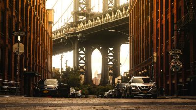 vehicles beside buildings