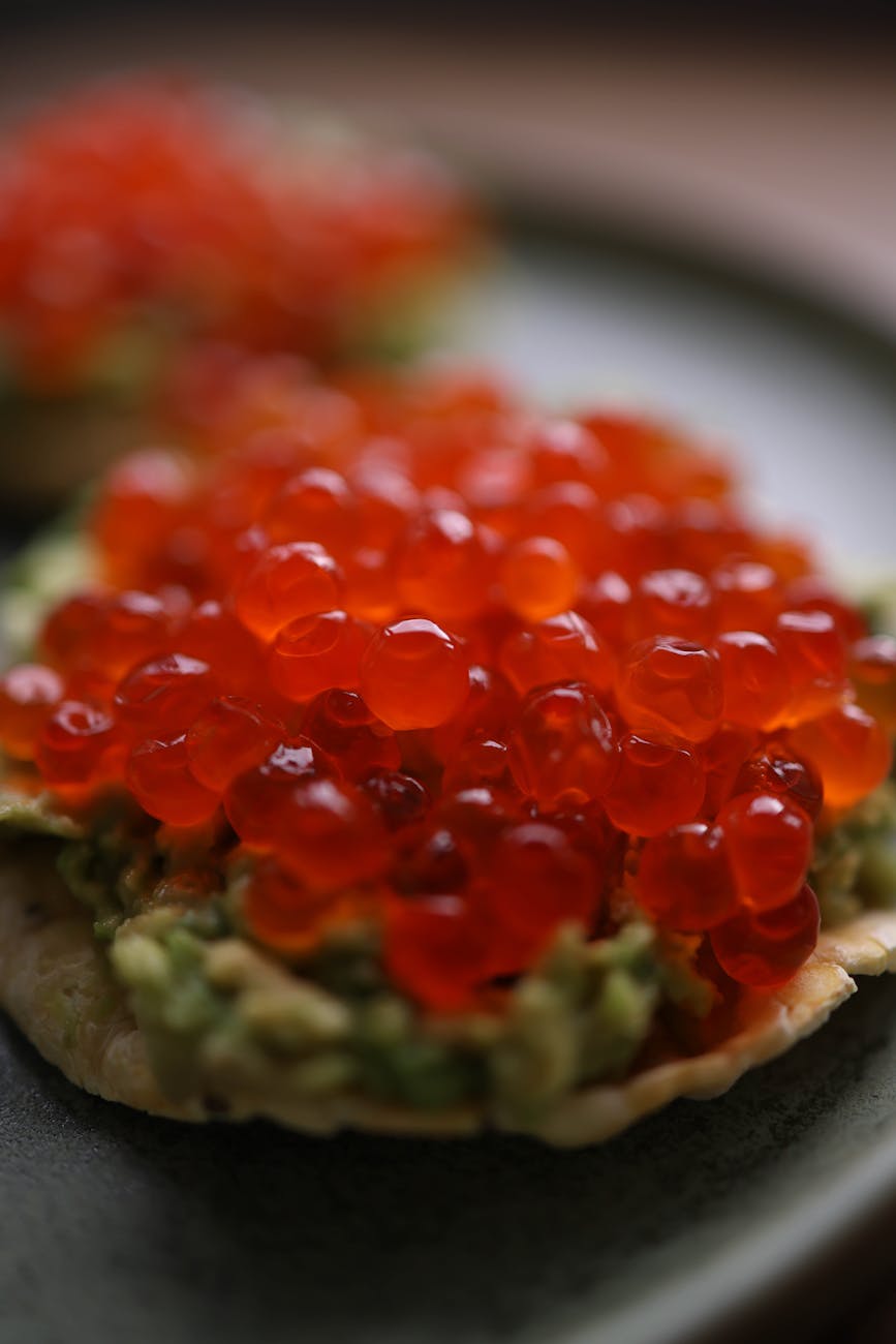 close up of red caviar on avocado toast