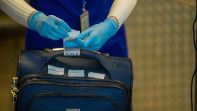 security checkpoint with luggage inspection