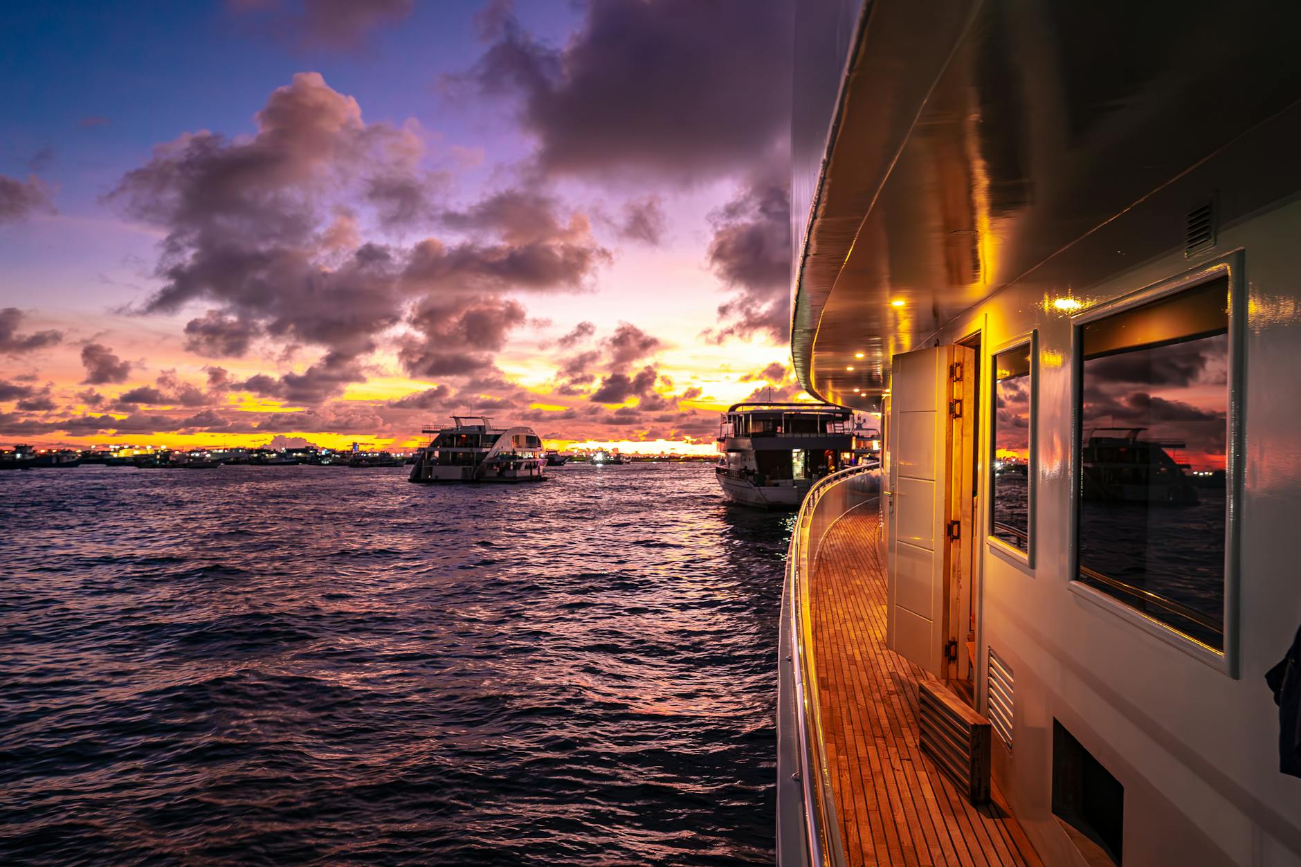 luxury yacht at sunset in the maldives