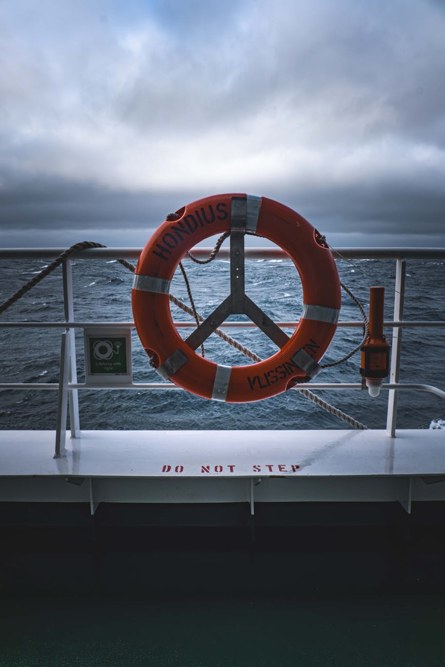 life saver ring on ship deck overlooking ocean