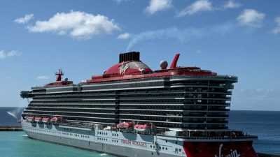 luxurious cruise ship docked at scenic port