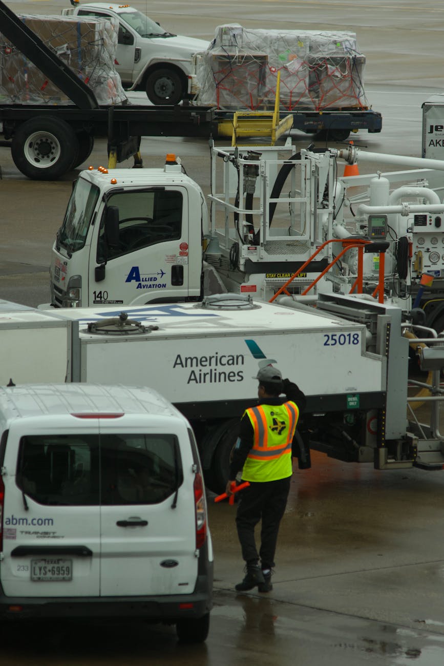 airline ground crew at busy airport terminal
